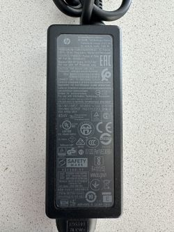 HP AC Power Adapter Part No: 854054-003, Output 19.5 V - 2.31 A.