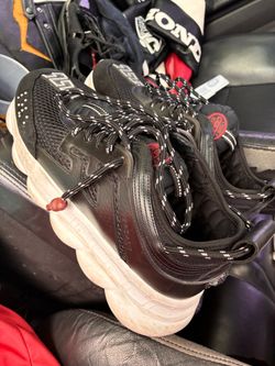 Prada and Versace shoes