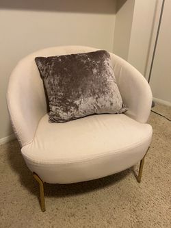 Pair of cream chairs with gold legs