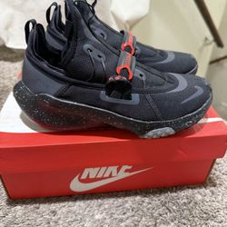 Nike Air Zoom Traverse Big Kids' shoes in a black colorway with red accents size 5y