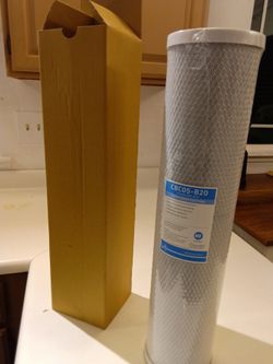 The Caware CBC05-B20 Carbon Block Cartridge Water Filter is a white under-sink filter designed to remove chlorine taste and odor. With a capacity of 1