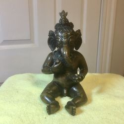 Baby Ganesha - Bala Ganapati enjoying sweets - brass statue