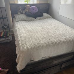 Headboard/frame with drawers, mattress and box spring included.