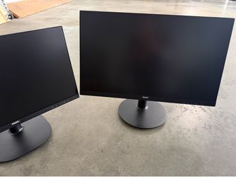 Two Philips Monitors - sell 1pm
