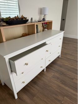 IKEA dresser with gold flower knobs