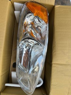 left headliht assembly chrysler sebring 2001 to 2003 / stratus 2001 to 2006 sedan convertable