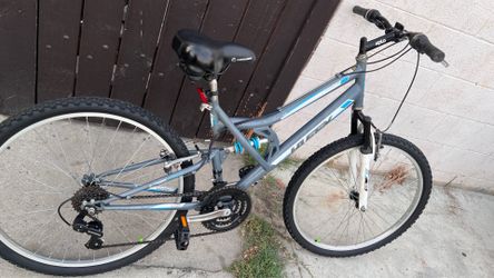 Gray and Blue Huffy Trail Runner , 26” tire size , dual suspension Mountain bike  ,