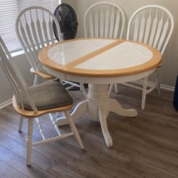 Table And Four Chairs. 