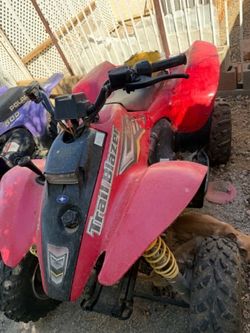 2 POLARIS 250 start up but smoke both have title