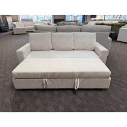 Beige corduroy sectional sleeper sofa with storage chaise and pull out bed