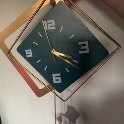 Modern Wall Clock With Pendulum