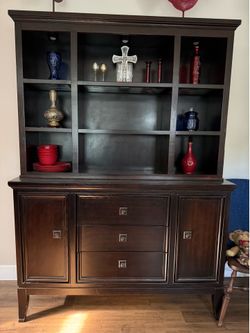 Dark wood buffet and hutch