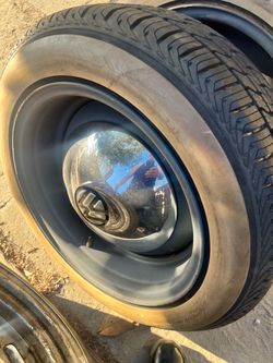 VW bug wheels with caps and tires