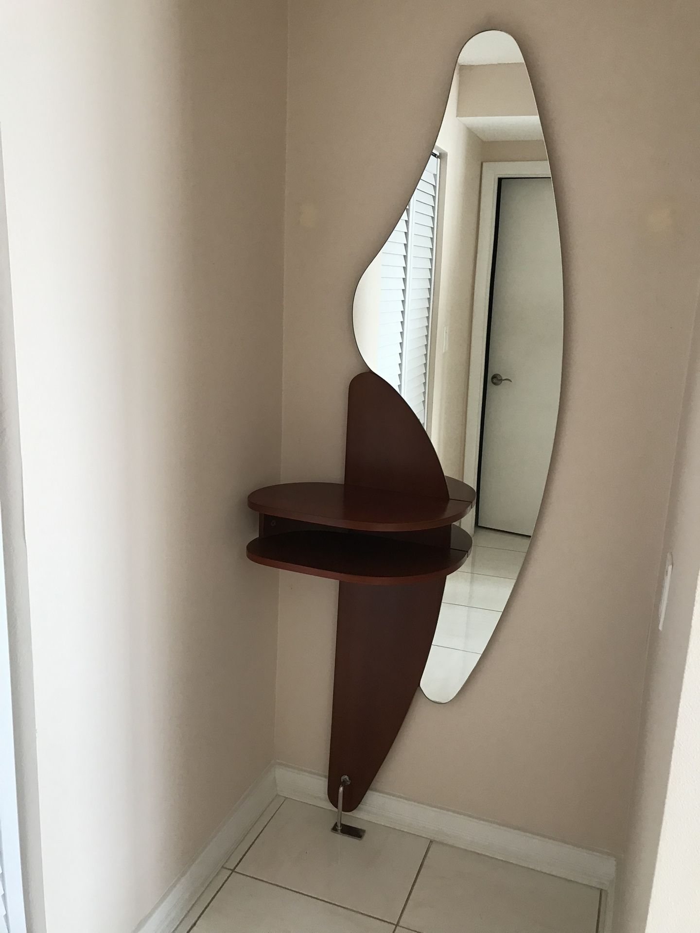 New Luxury Italian entrance console table with mirror. Mirror has a custom shape. Solid wood table color: Brown Cherry. H80”X W26”. Made In Italy .
