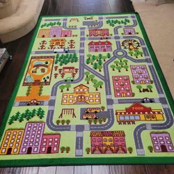 Kids area rug 5’ x 7’5”
