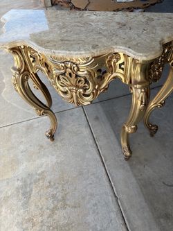 Gold color  mirror and console with top marble