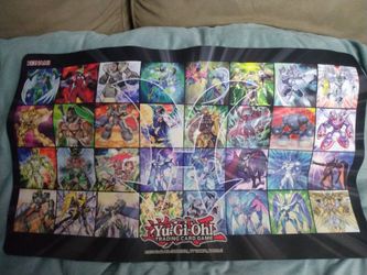 Yu-Gi-Oh playmat with Monster protectors tube