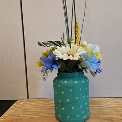 Handmade painted glass jar/vase with forever Flowers 

Handmade glass jar/vase with assorted silk fabric flowers arrangement
Daffodils 
Wildflowers 
G