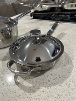 Pot and pans  8.5 inch pan brand new  Brand: our place  Pick up only  Located in sun valley
