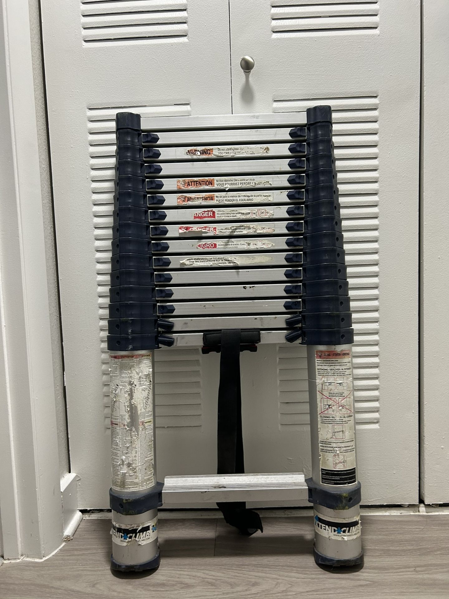 Extend Climb Telescoping Extension Ladder