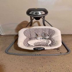 production table Infant Swing – Plush and Snug for Your Baby’s Relaxation