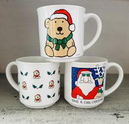 3 Vintage Boynton christmas mugs 12 oz size. One has Cool Santa and two have Christmas bears. 