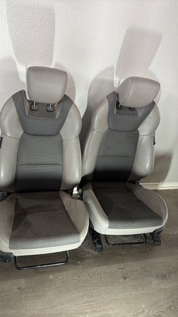 Pair of Gray Leather Car Seats with Headrests