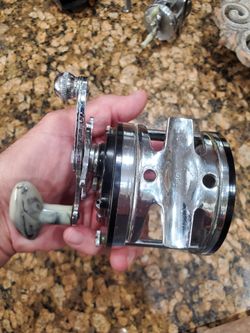 Fishing REELS ,PENN 250, LASLESS NO.1700, AND PFLUEGER FLY REEL NO.1700