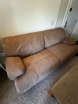 Couch with reclining chairs.