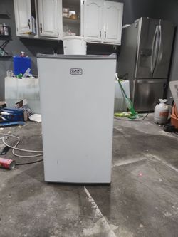 Black and decor mini fridge.