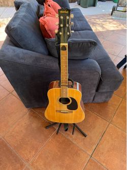 Guitar with stand