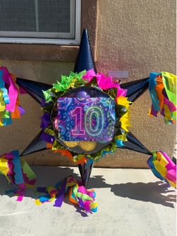 Neon number 10 star pinata with balls