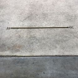 2 Gold Curtain rods