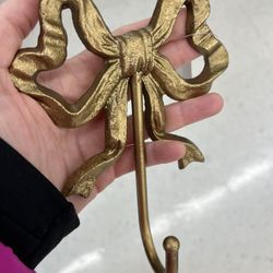 Gold bow hook