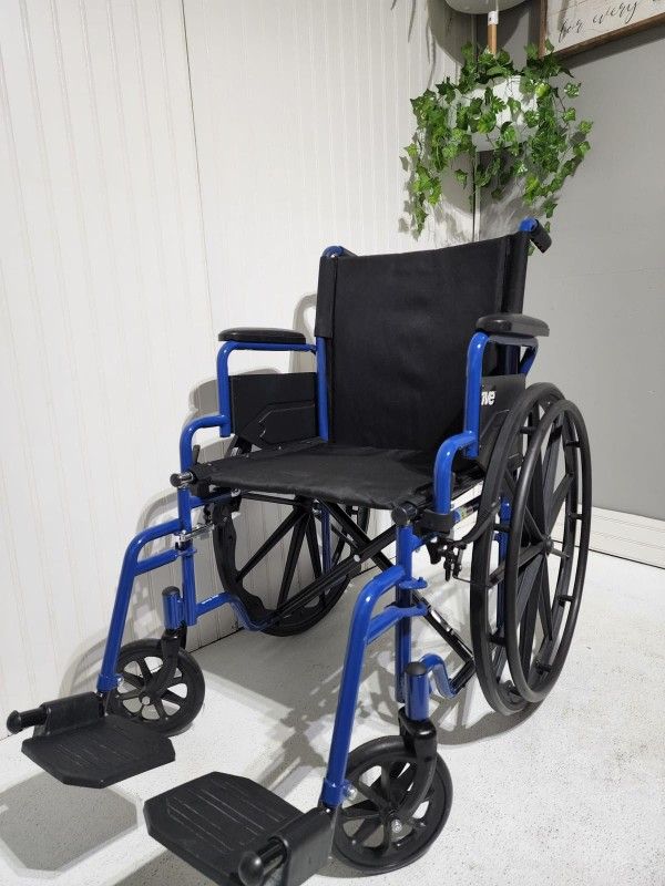 Whell Chair/ Silla De Ruedas