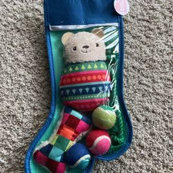 cute stocking with dog toys new condition 