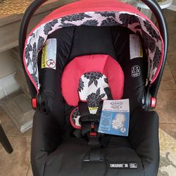 Graco SnugRide infant car seat,  a SnugRide 30 