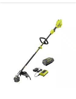 NEW IN BOX Shop RYOBI 40V 15 in. Expand-It Cordless Battery Attachment Capable String Trimmer with 4.0 Ah Battery and Charger