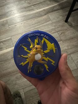 pokemon marble holder with 2 marbles