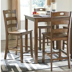 Hazelteen Medium Brown Counter Height Dining Table and Bar Stools (Set of 5)  