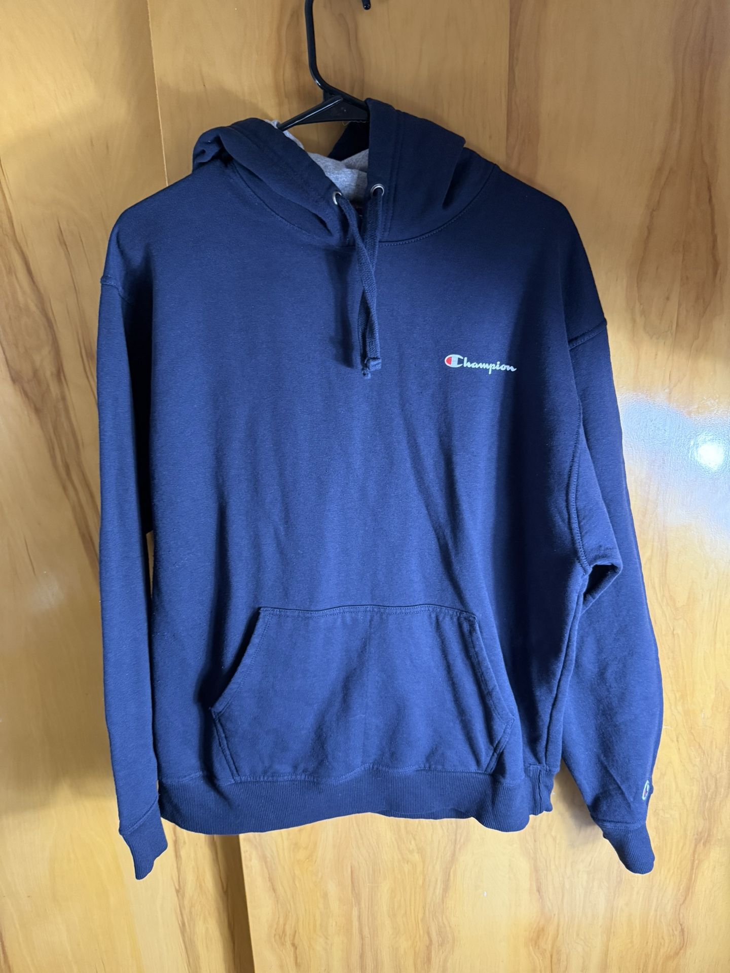 Champion Navy Blue men’s pullover hoodie  Large on tag In very good condition