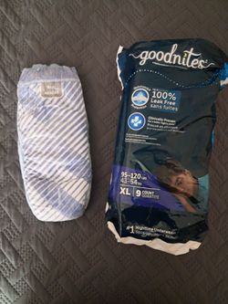 OPEN PACK OF GOODNITES DIAPERS 8 OUT 9 DIAPERS