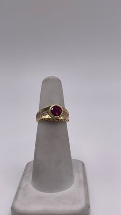 14k gold ring with red CZ