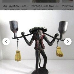NEAT Vintage Solid Wright Iron Hand Crafted Painted Monkey Man Carrying 2 Loads Of Bananas and 2 Candle Holders 10" H X 9.5"W. 

