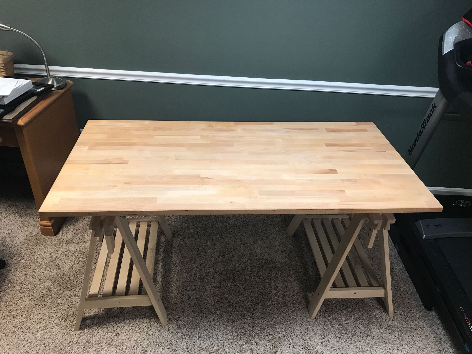 Beech and natural wood IKEA desk top with saw horse legs