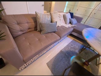 L shape couch . From city furniture