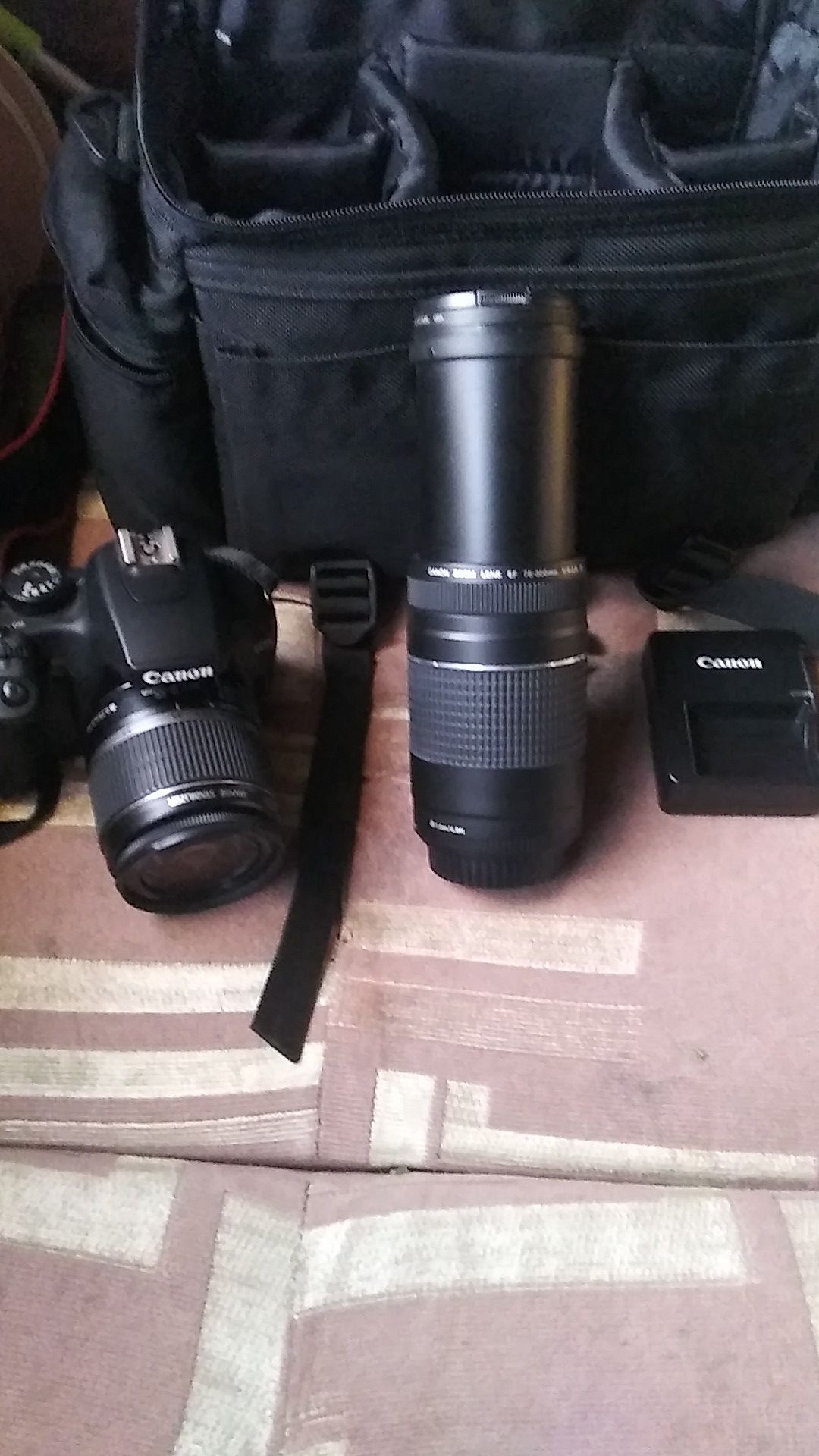 Canon rebel xs /w 75-300mm extra lense, charger,and memory stick