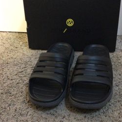 These are Cole Haan 4Zerogrand All Day Slide Sandal