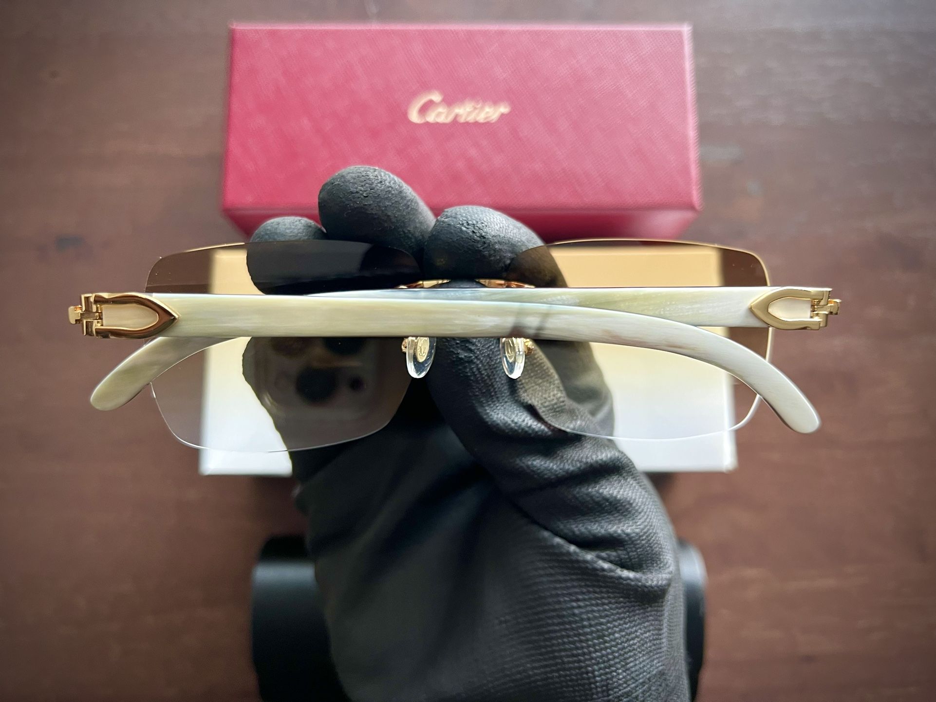 Real vs best sale fake cartier glasses