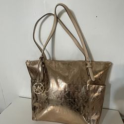 Michael Kors Bag In Bronze USED but Still Fine